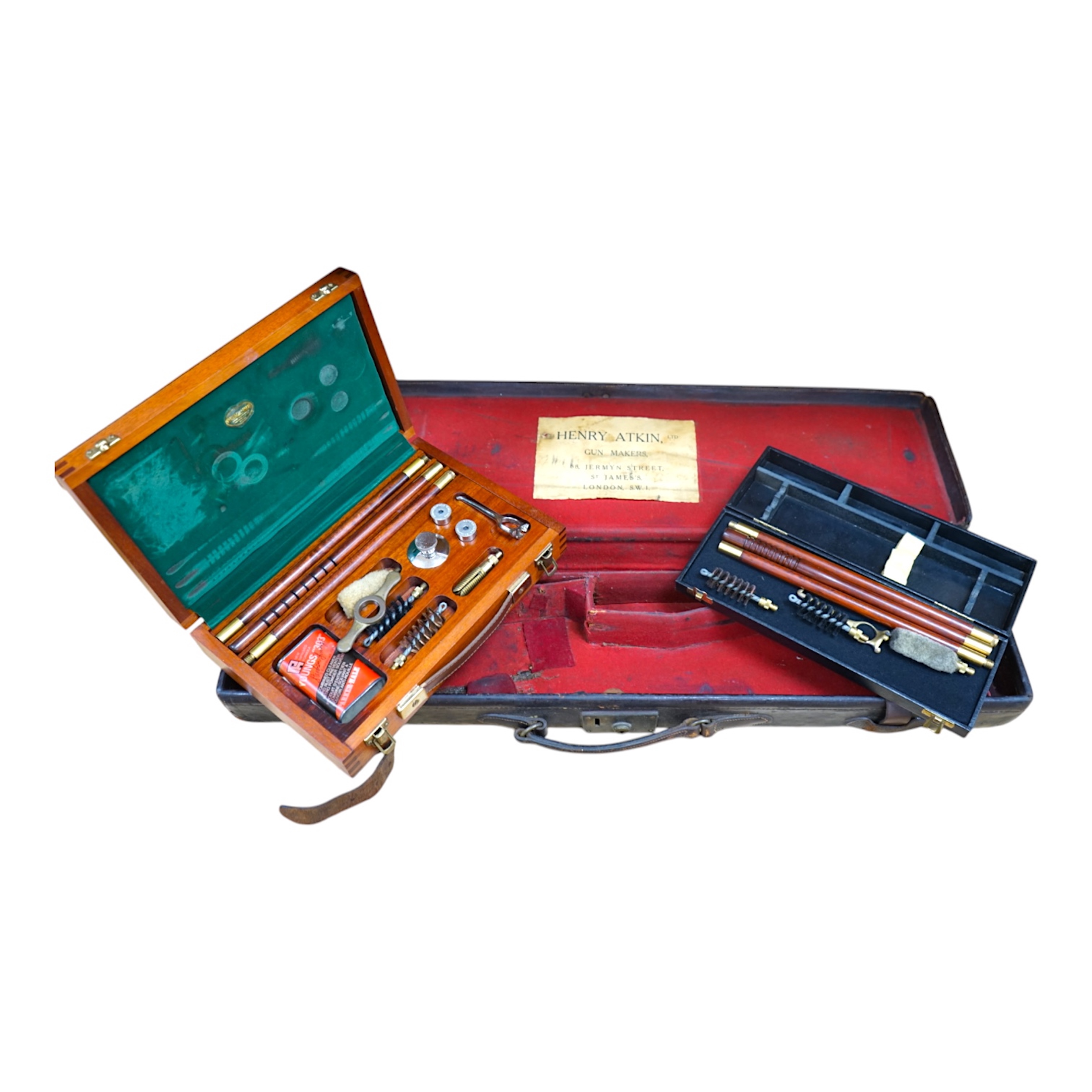 Two cases of gun cleaning equipment and a 19th century leather gun case, 83cm long. Condition - fair to good